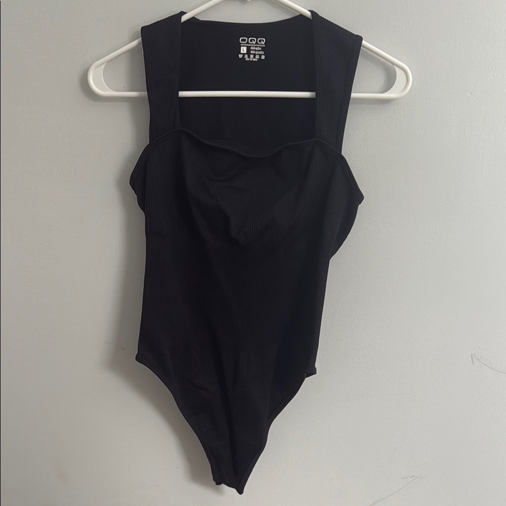 Black One Piece Bodysuit with Scoop Neckline and Sleeveless Design